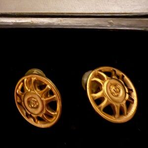 CHANEL Gold-Tone Round Wheel Clip-On Earrings with Yellow Accent